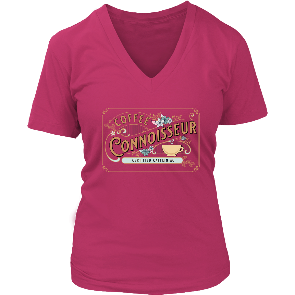a coral colored woman's v-neck shirt with the coffee connoisseur design by Caffeiniac on the front