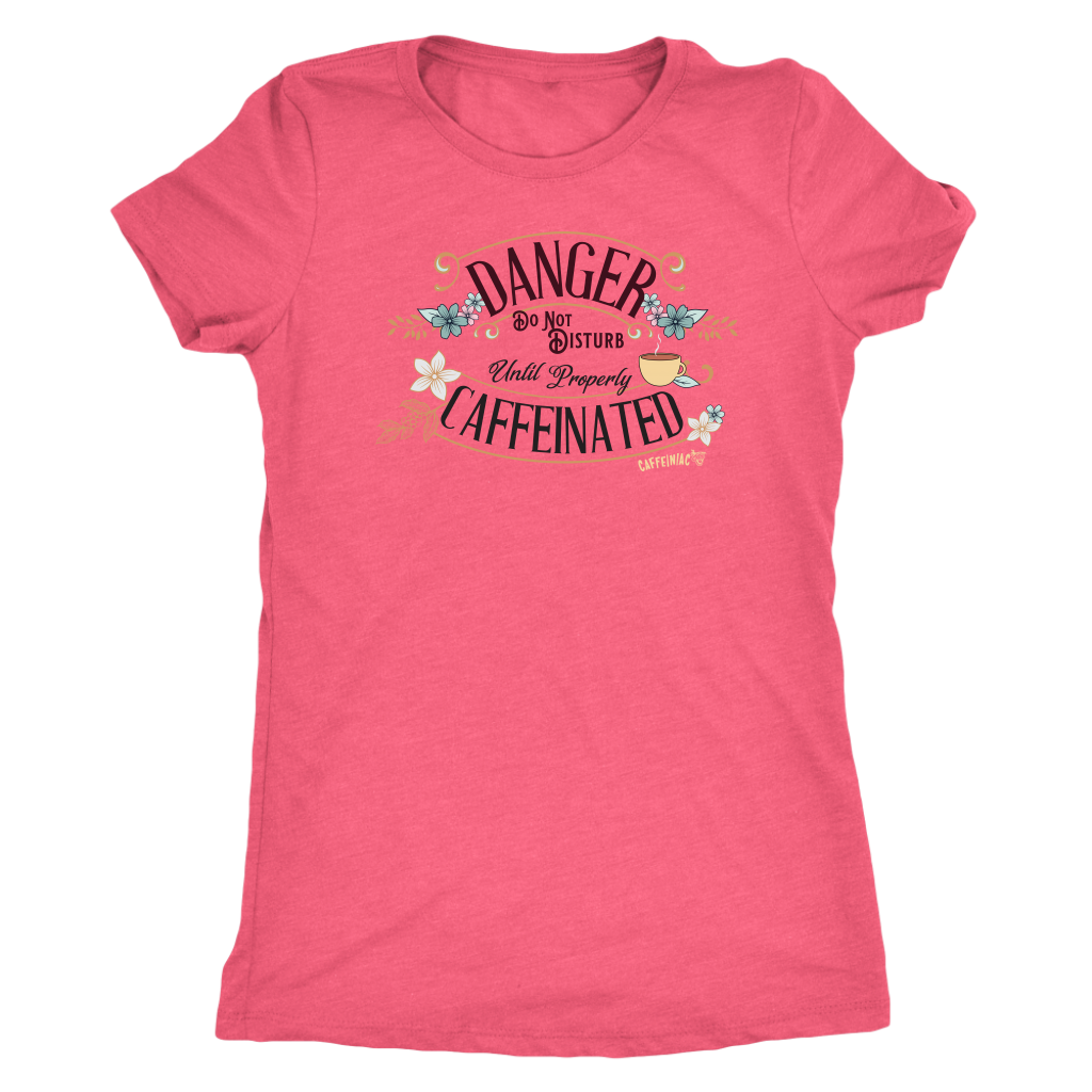 a women's pink tee featuring the Caffeiniac design DANGER do not disturb until properly caffeinated