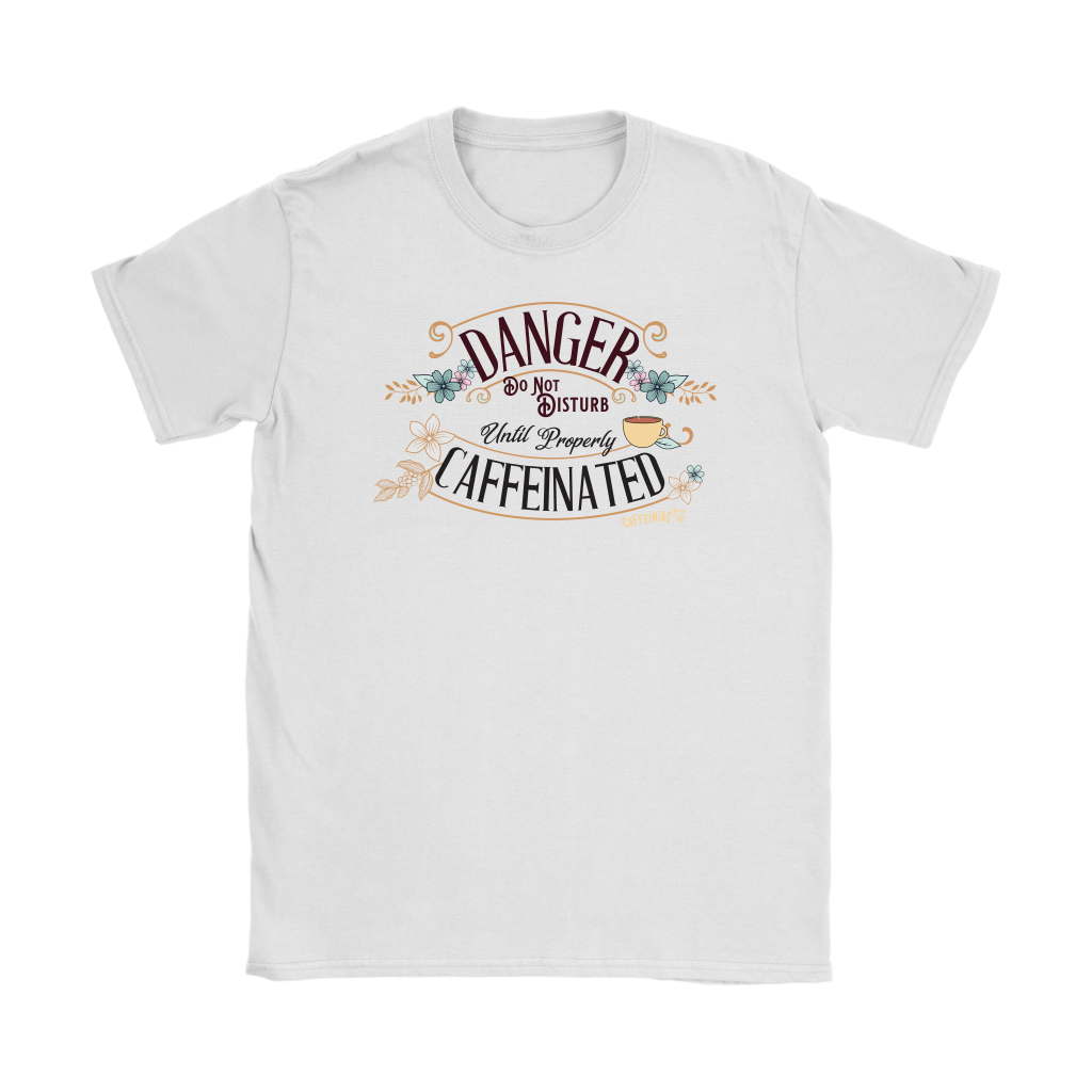 a woman's white t-shirt featuring the Caffeiniac design DANGER do not disturb until properly caffeiniated