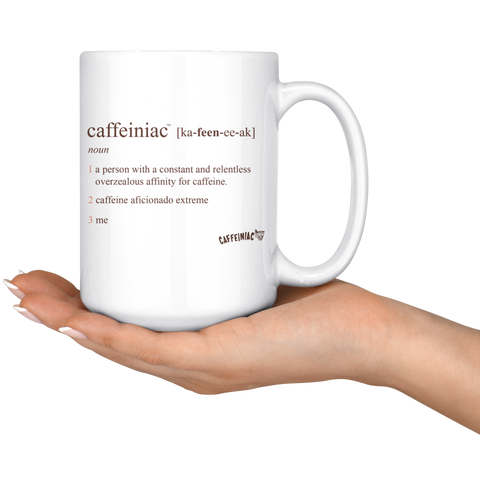 Image of  a white 15oz  coffee mug with the original Caffeiniac defined design in brown ink