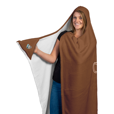 Image of woman holding the right glove area of a  luxurious hooded blanket featuring the Caffeiniac design COFFEE AND NOBODY GETS HURT