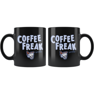 a black ceramic coffee mug with the Caffeiniac design COFFEE FREAK in light blue letters on front and back