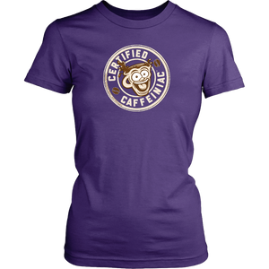 front view of a womans purple shirt featuring the Certified Caffeiniac design in tan ink on the front