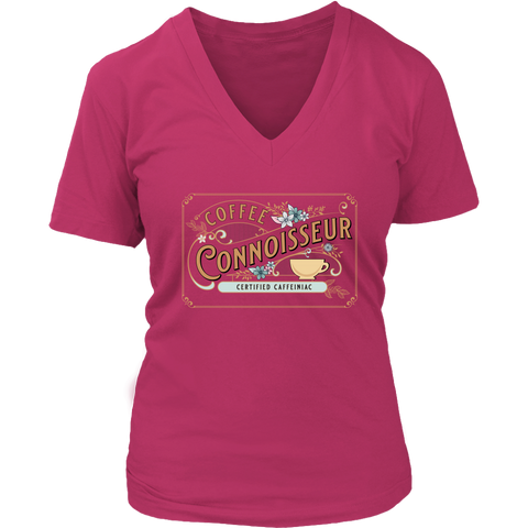 Image of a coral colored woman's v-neck shirt with the coffee connoisseur design by Caffeiniac on the front