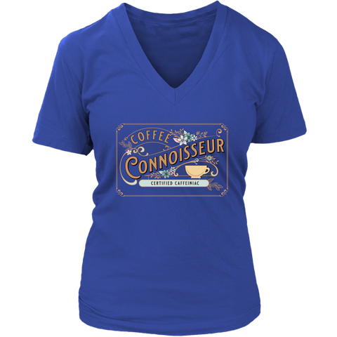 Image of a royal blue woman's v-neck shirt with the coffee connoisseur design by Caffeiniac on the front