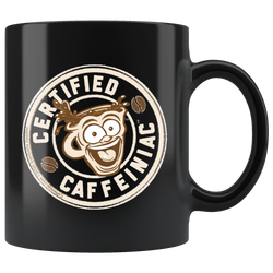 a black coffee mug featuring the Certified Caffeiniac design in tan and brown printed on the front and back