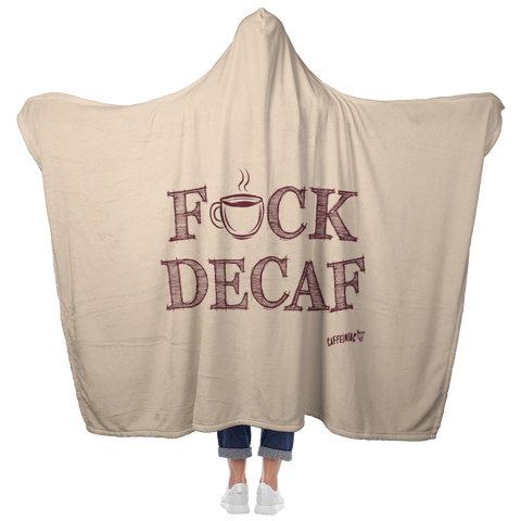 Image of woman standing holding her arms out to show the fullback view of a luxurious hooded blanket featuring the Caffeiniac design F_CK DECAF