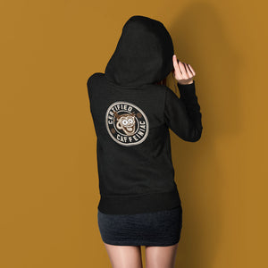 a woman standing near a well wearing a black hoodie with the Certified Caffeiniac design full size on the back