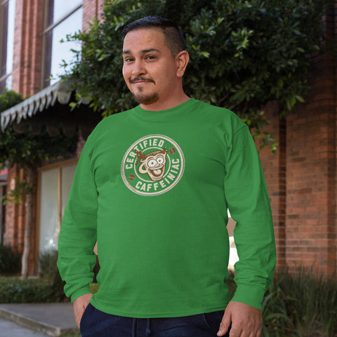 Image of Smiling man wearing green long sleeve t-shirt with the Certified Caffeiniac design in tan ink