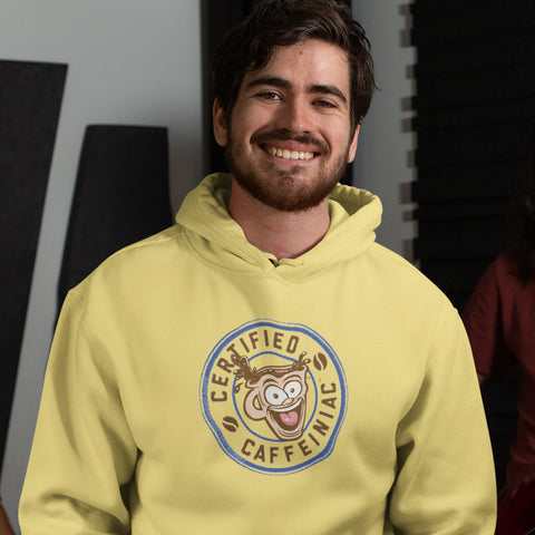 Image of smiling man wearing a yellow unisex hoodie with the Certified Caffeiniac design on the front