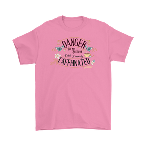 a men's pink t-shirt featuring the Caffeiniac design "Danger Do Not Disturb Until Properly Caffeinated".